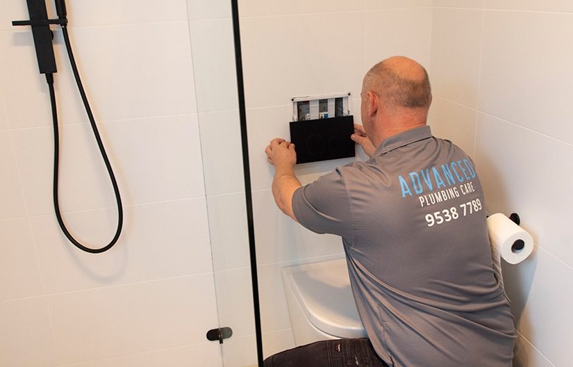 A Plumber Fixing the Bathroom Switch in Sydney, NSW