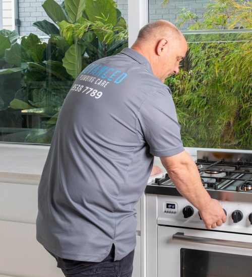 A Plumber Testing the Gas Stove in Sydney, NSW